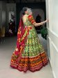 Lorenvalley Green Tussar Silk Patola Print With Foil Work And Original Mirror Gamthi Lace Lehenga Choli with Dupatta Online